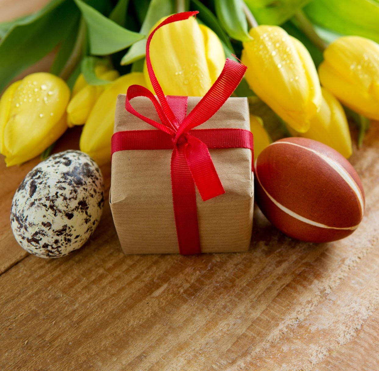 Happy Easter eCard for Charity. Flowers, present box and eggs